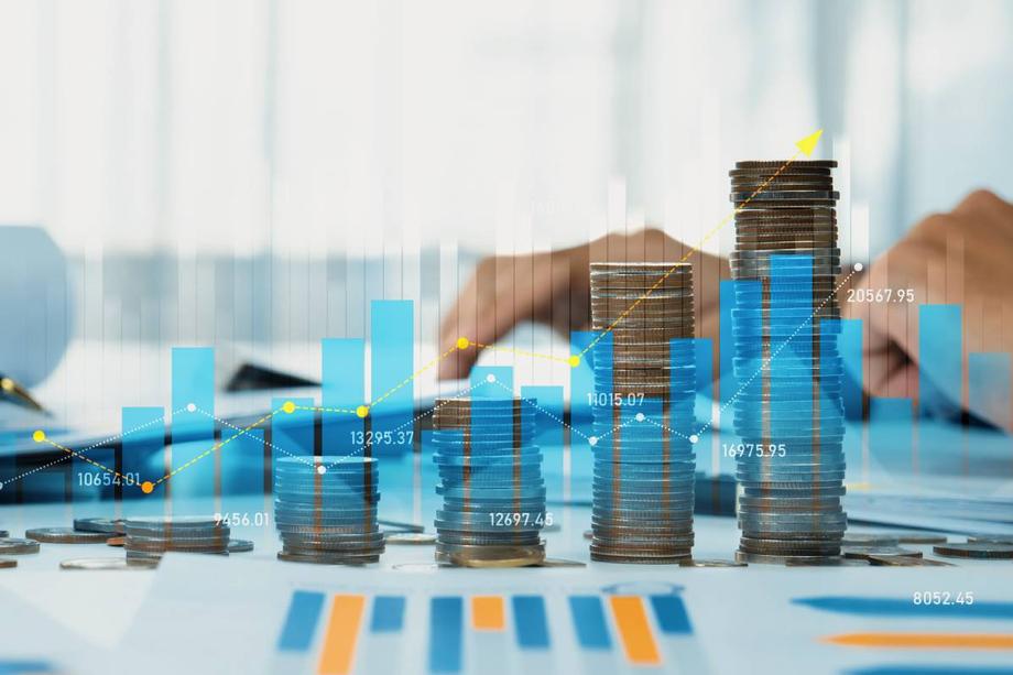 Coin stack with digital graphic indicator symbolizing financial planning near Lexington and Aiken, South Carolina (SC)